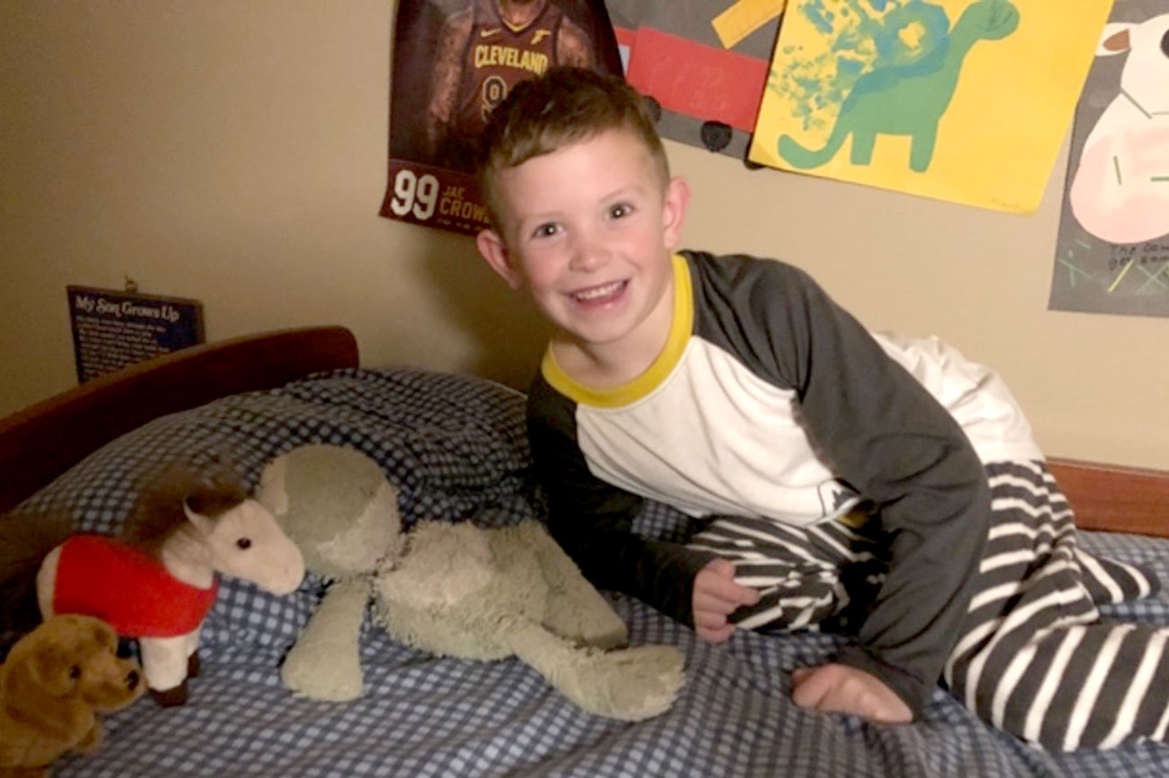 A happy Travis after Froggy is returned